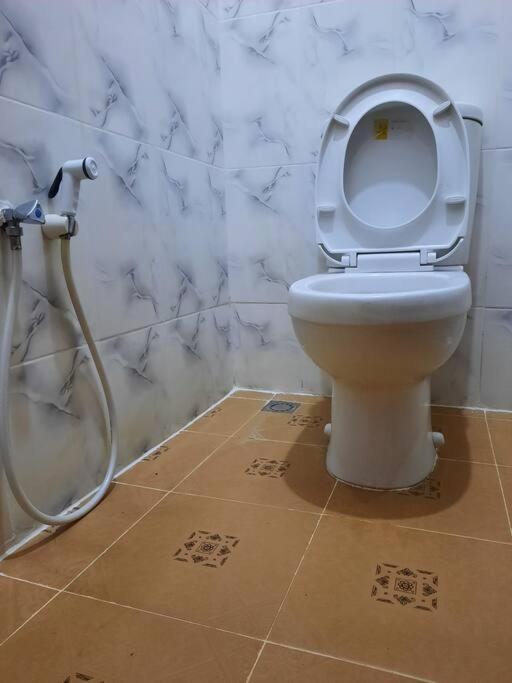 Ellyz Home Stay Moshi Buitenkant foto