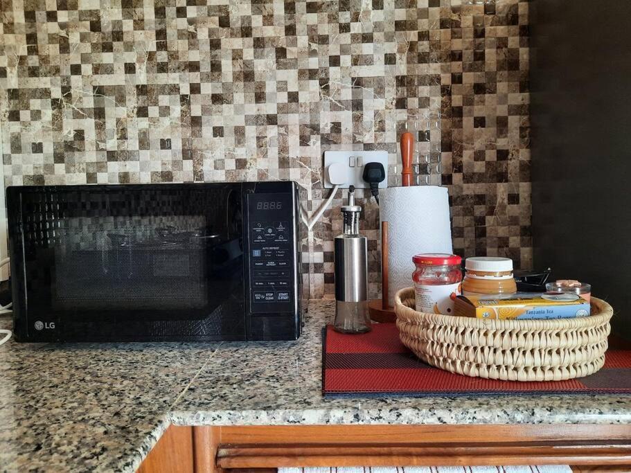 Ellyz Home Stay Moshi Buitenkant foto