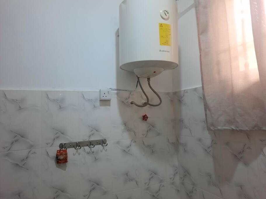 Ellyz Home Stay Moshi Buitenkant foto